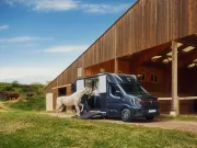Renault Trucks Master Red EDITION Exclusive - floor cab fitted with a horse transport body, a rider climbs her horse on the back of the vehicle