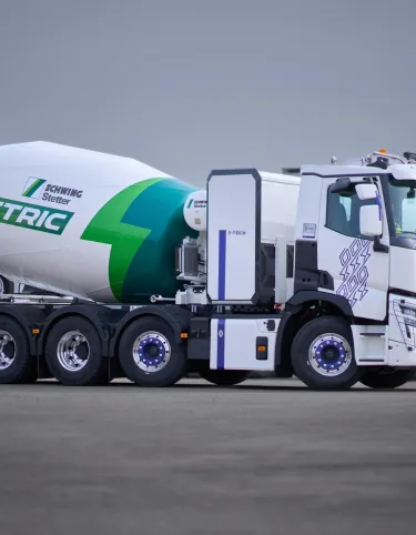 Renault Trucks E-Tech C 10x4 equipped with a Schwing Stetter concrete mixer, the first 100% electric concrete transport solution to decarbonize concrete transport, deliver in cities, and access low-emission zones (LEZs).
